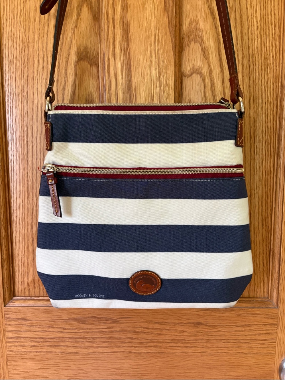 Dooney & Bourke Navy and White Striped Crossbody Bag with Brown Strap